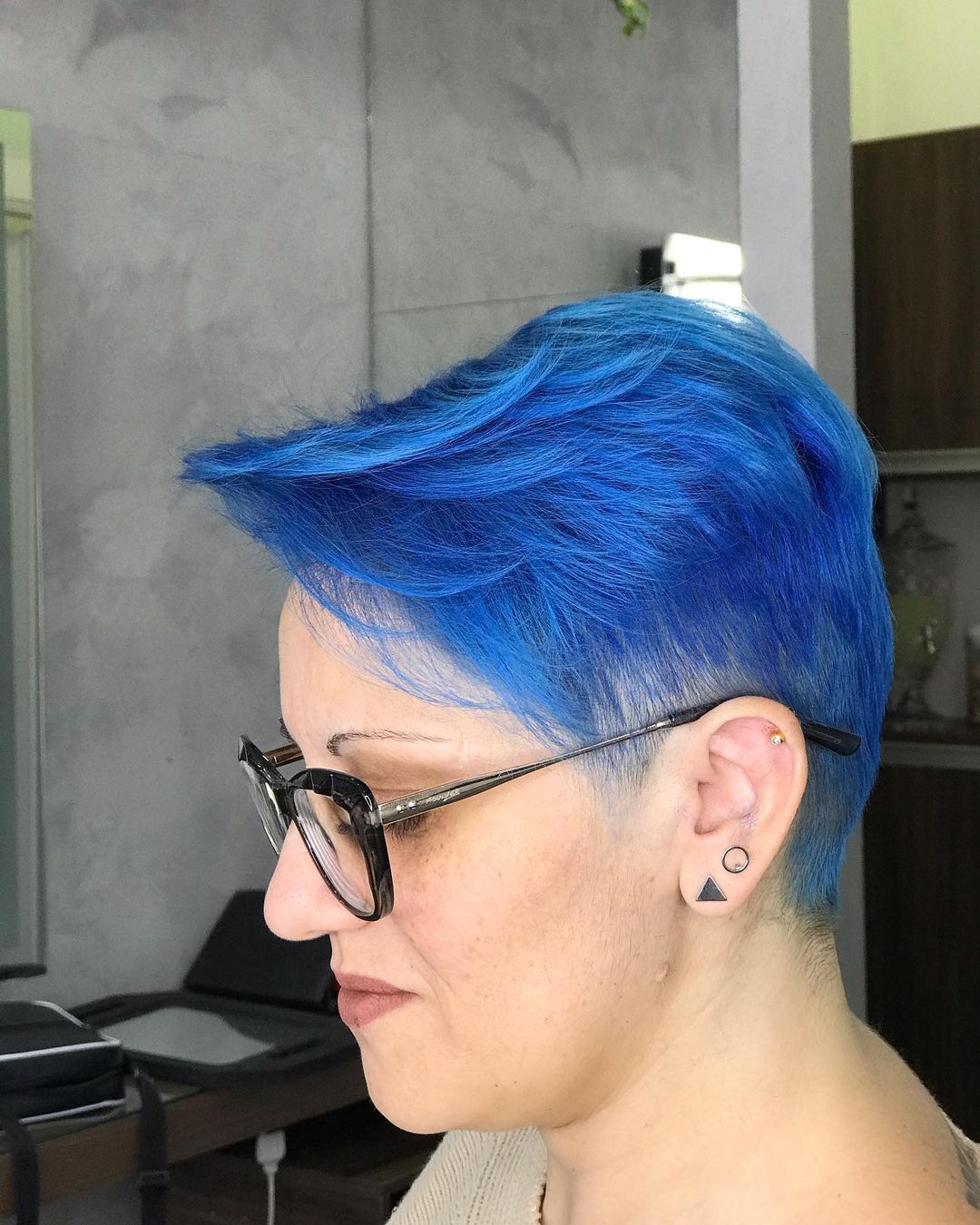 Get Noticed With A Pixie Cut Blue Highlights Dazzle With A Bold And Beautiful Look 